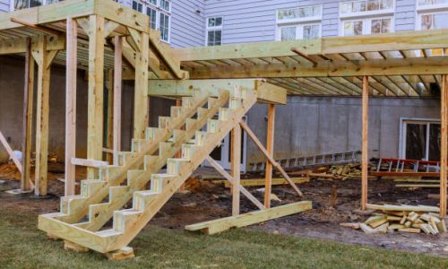 Installing deck patio construction. boards with above ground deck Installing deck patio construction. boards with above ground deck