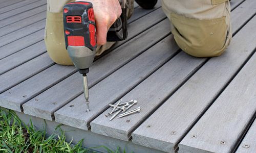 Fixing composite decking with screw gun Fixing composite decking with screw gun